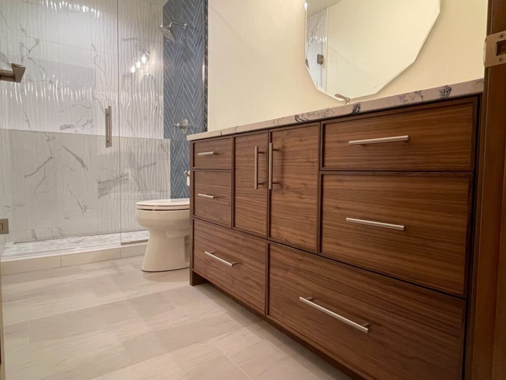 walnut-wood-vanity-in-greenville-wi-basement-bathroom