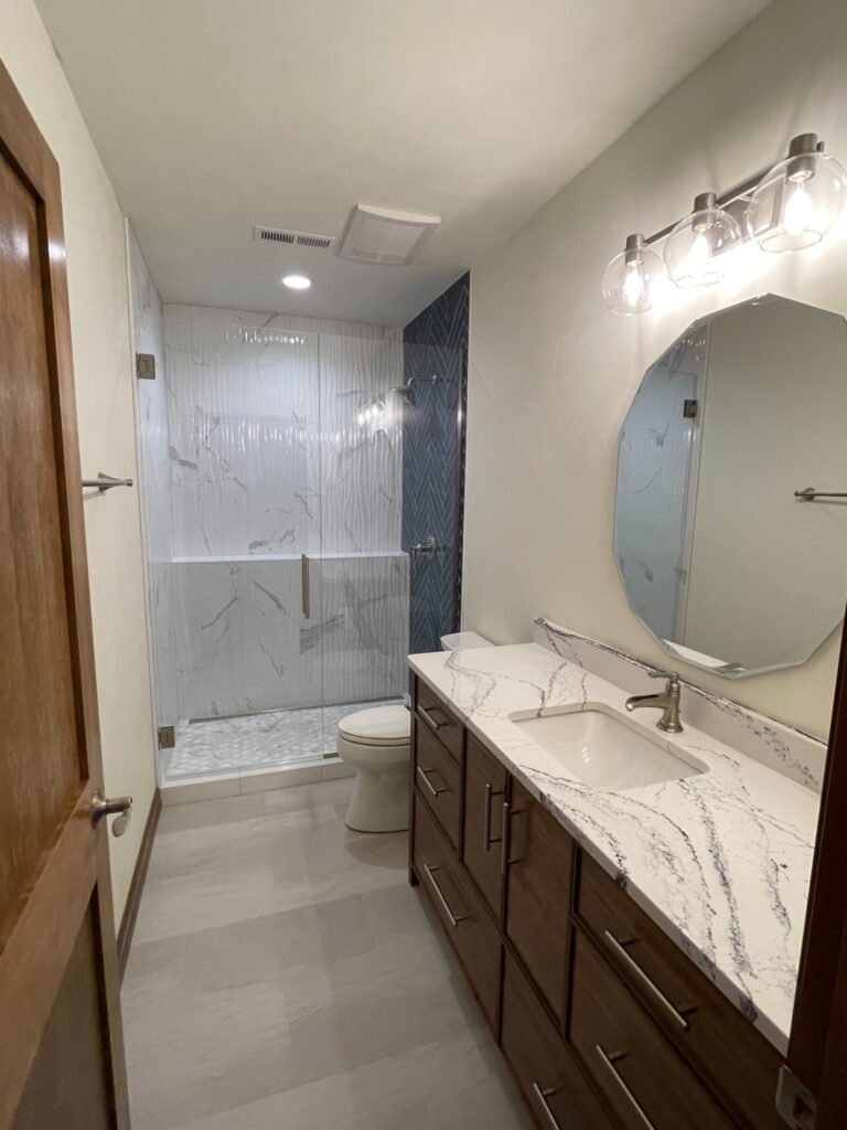white-marble-vanity-in-greenville-wi-basement-bathroom