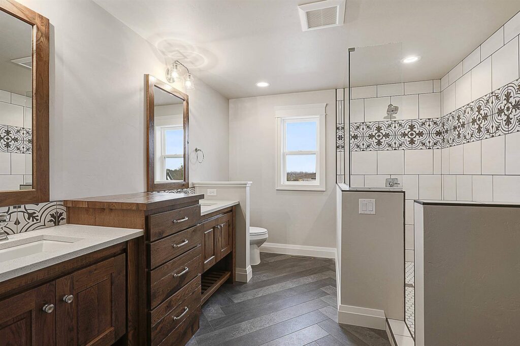 bathroom-with-encaustic-tile-detail-and-herringbone-floor