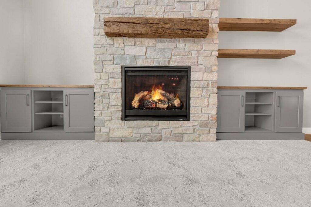 stone-fireplace-with-natural-wood-mantle-and-gray-built-ins