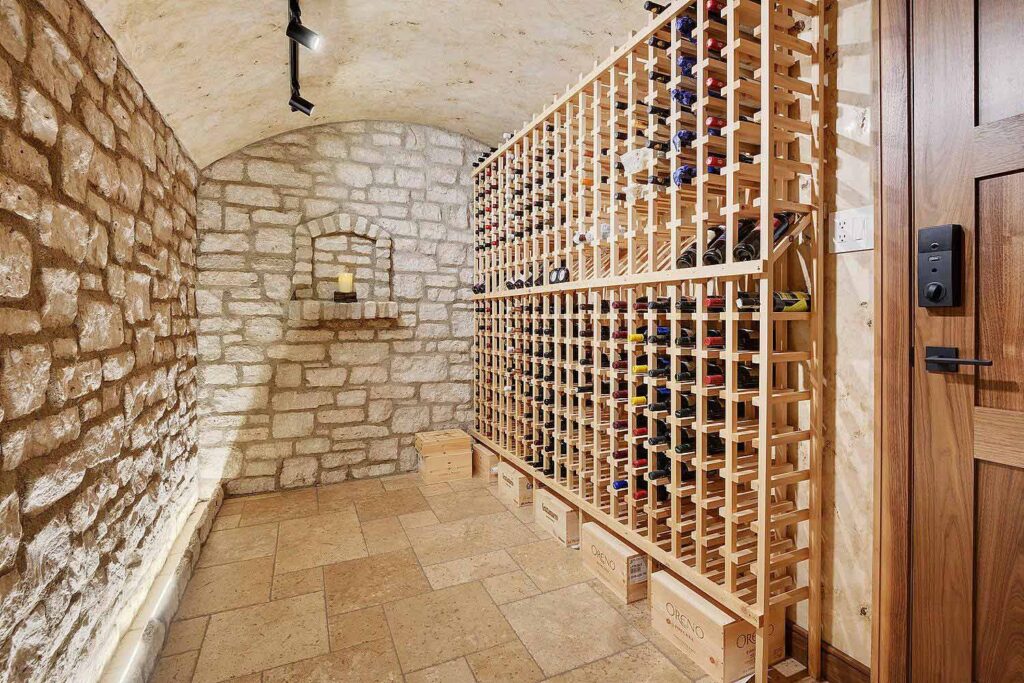tuscan-style-stone-wine-cellar-with-large-storage-rack