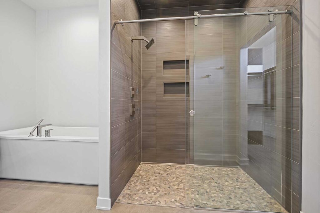 bathroom-with-large-walk-in-shower-and-glass-door