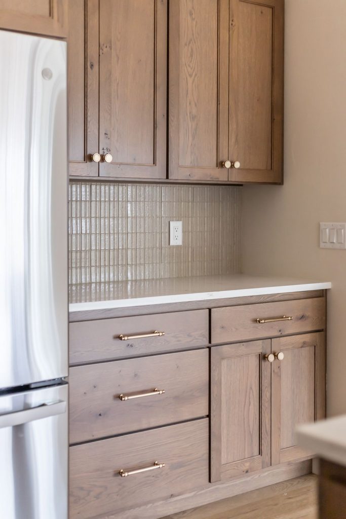 Close-up of custom tile backsplash with detailed finishes and craftsmanship